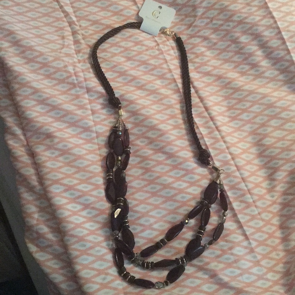 Long length brown rope necklace. Gold tone.